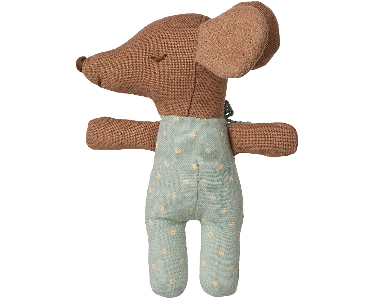 Stuffed toy mouse in a green outfit with gold polka dots on a white background