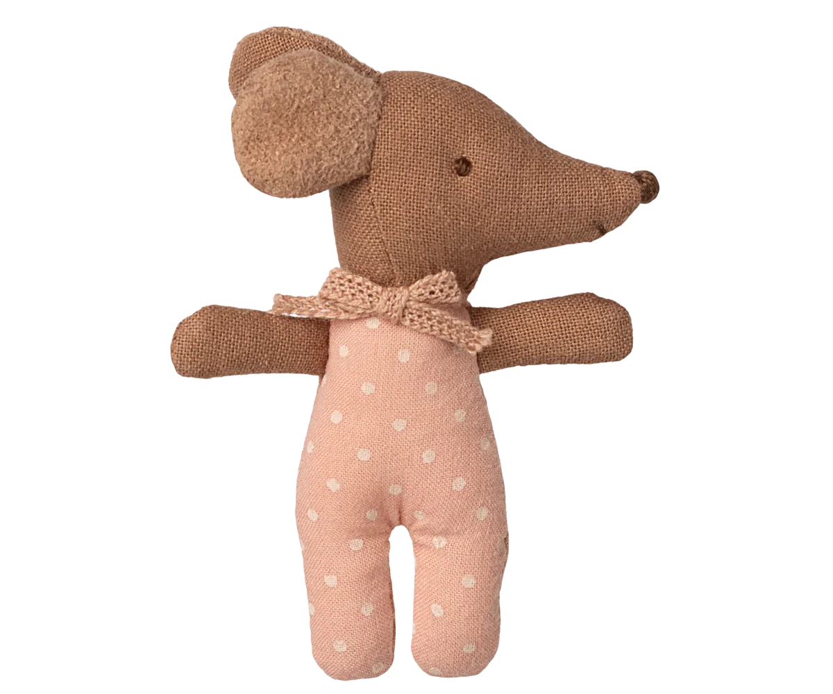 Stuffed toy mouse with a bow tie on a white background