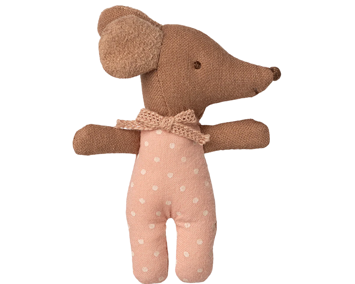 Stuffed toy mouse with a bow tie on a white background