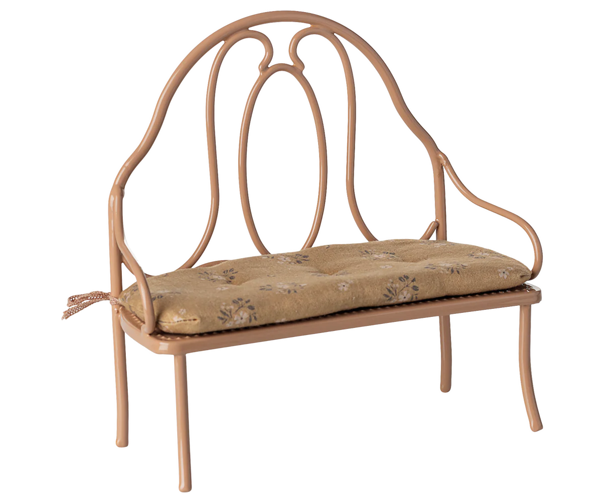 Decorative metal bench with a cushion on a white background | Maileg UK