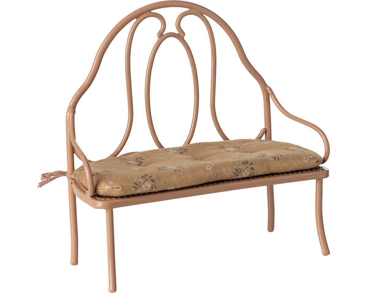 Decorative metal bench with a cushion on a white background | Maileg UK