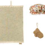 Set of miniature bath items including a textured towel, floral shower cap, and scrubber on a white background | Maileg UK