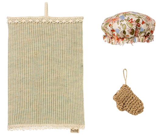 Set of miniature bath items including a textured towel, floral shower cap, and scrubber on a white background | Maileg UK