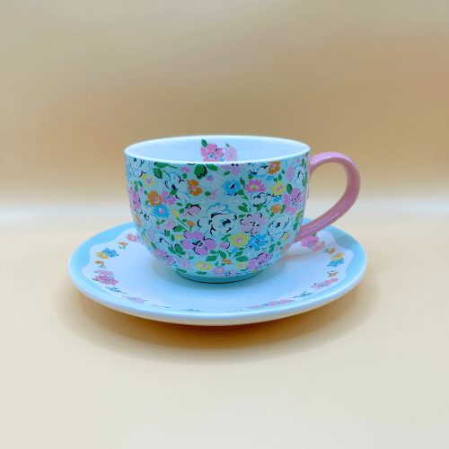 Floral cath kidston mug and saucer with a pink handle and a vintage bright and happy style. The perfect gift