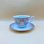 cath kidston bone china cup and saucer kitsch design with flowers and intricate detailing. english tea never tasted so good
