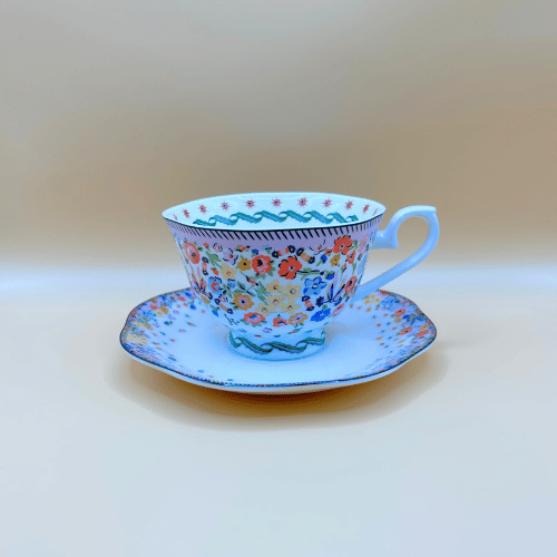 cath kidston bone china cup and saucer kitsch design with flowers and intricate detailing. english tea never tasted so good