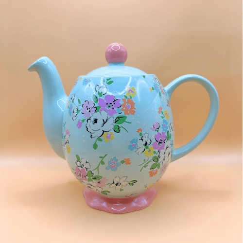 Beautiful floral stoneware teapot with pink detailing and vintage cath kidston floral pattern in pastel cheerful colours