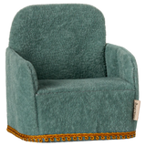 A green folding chair with a plush texture, designed for small maileg figures to sit in. | Maileg UK