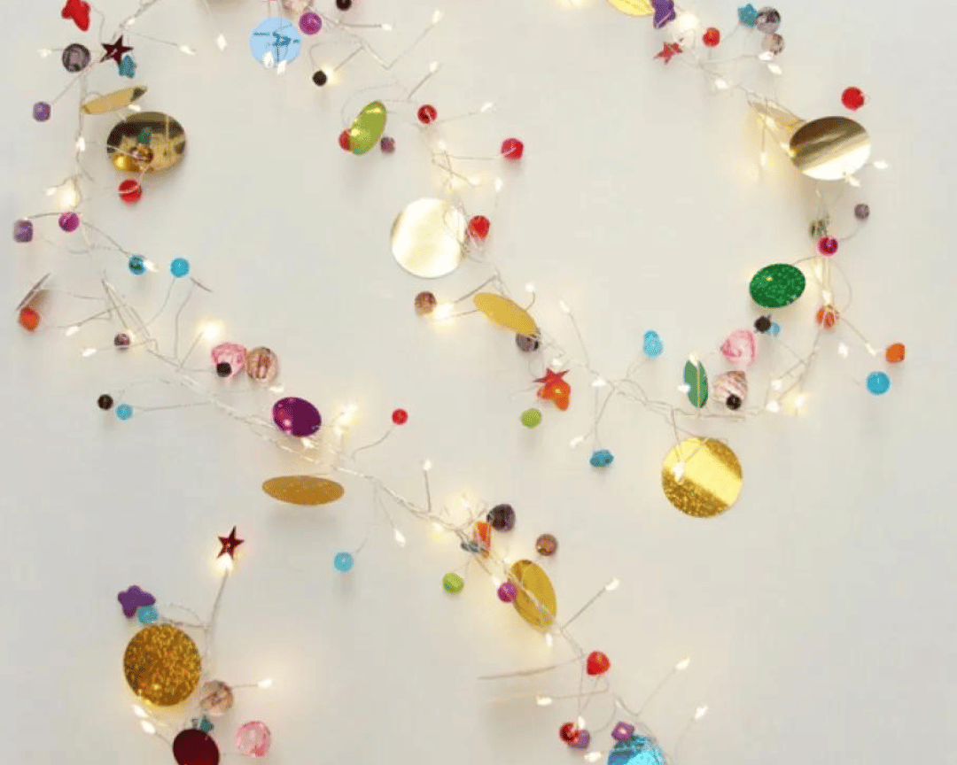 Beautiful Mains Powered String of Lights with sequins, bells and sparkles giving a whimsical effect | Indoor Twinkles