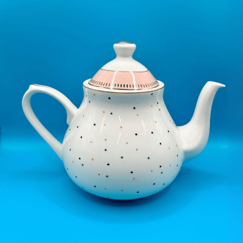 Back of the yvonne ellen bone china white teapot with polka dot pattern, a beautiful addition to any tea set