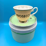 yvonne ellen boozy cup and saucer stood on its pastel colour hat box gift box making it the perfect gift for any tea (or prosecco) lover you know!