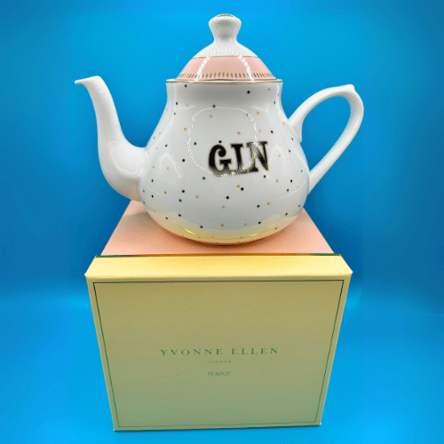 yvonne ellen boozy gin teapot shown with its colourful gift box perfect to gift to a friend who loves  a cup of tea (or gin!)