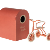 Maileg Coral Tricycle with its hanger storage box, cream handles and wheels and a wooden seat for your mouse to sit on