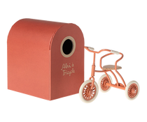 Maileg Coral Tricycle with its hanger storage box, cream handles and wheels and a wooden seat for your mouse to sit on