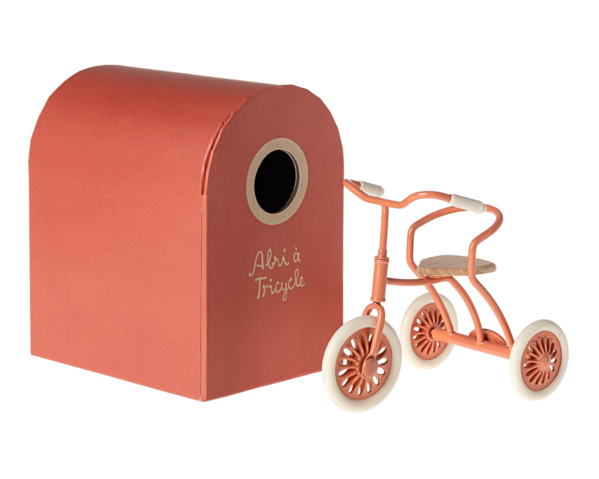Maileg Coral Tricycle with its hanger storage box, cream handles and wheels and a wooden seat for your mouse to sit on