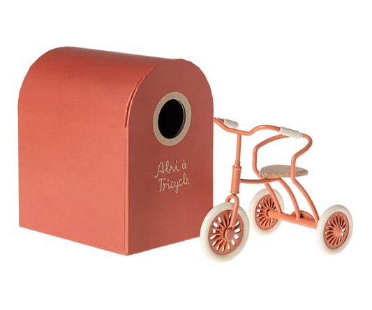 Maileg Coral Tricycle with its hanger storage box, cream handles and wheels and a wooden seat for your mouse to sit on