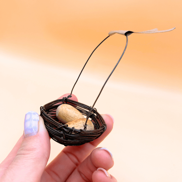 Wire Nest with Plain Wooden Eggs